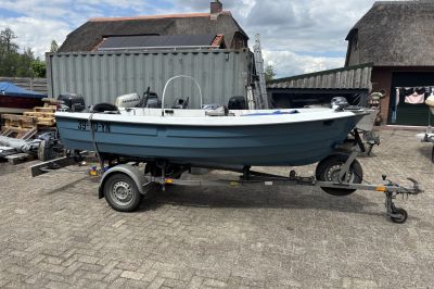 Ryds 425R met 25 pk Suzuki en trailer