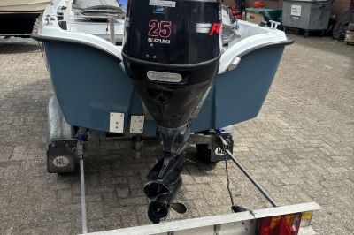 Ryds 425R met 25 pk Suzuki en trailer