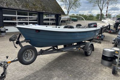 Ryds 425R met 25 pk Suzuki en trailer