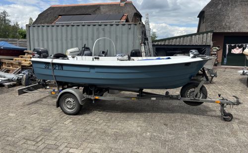 Ryds 425R met 25 pk Suzuki en trailer